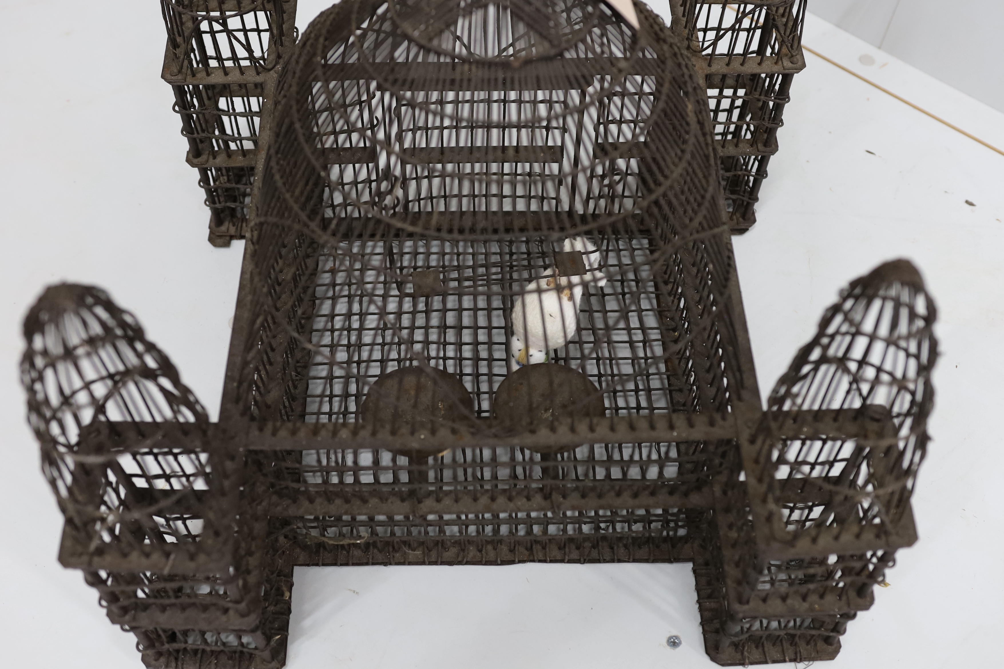 A vintage wirework bird cage, width 47cm, height 42cm